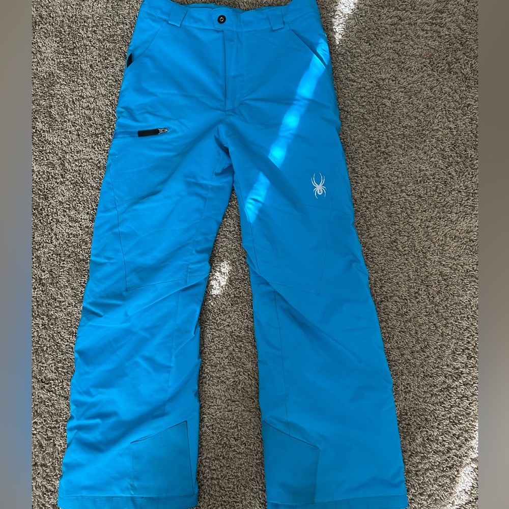 SPYDER Snowboard/Ski pants with extend an inch length feature.